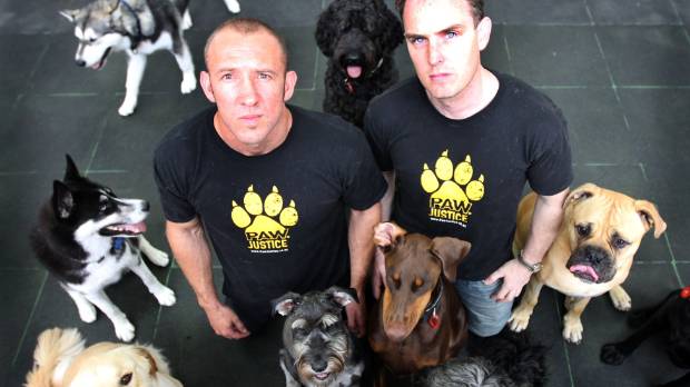 Paw Justice owners with dogs